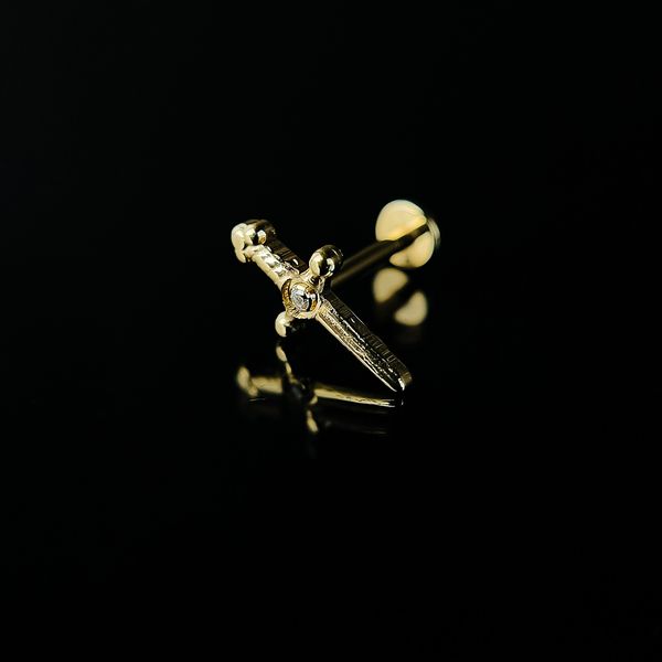 Титановий кинжал з цирконом на лабрет в золоті  фото